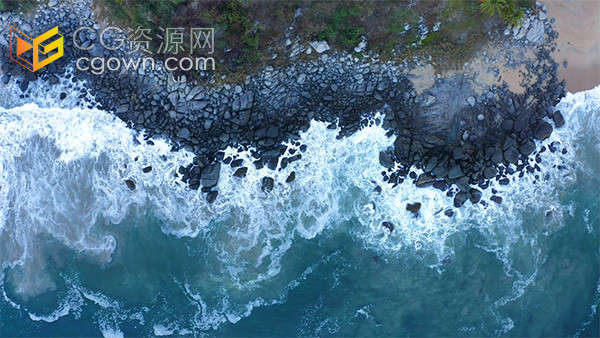 航拍海边岸上浪花礁石俯瞰实拍视频